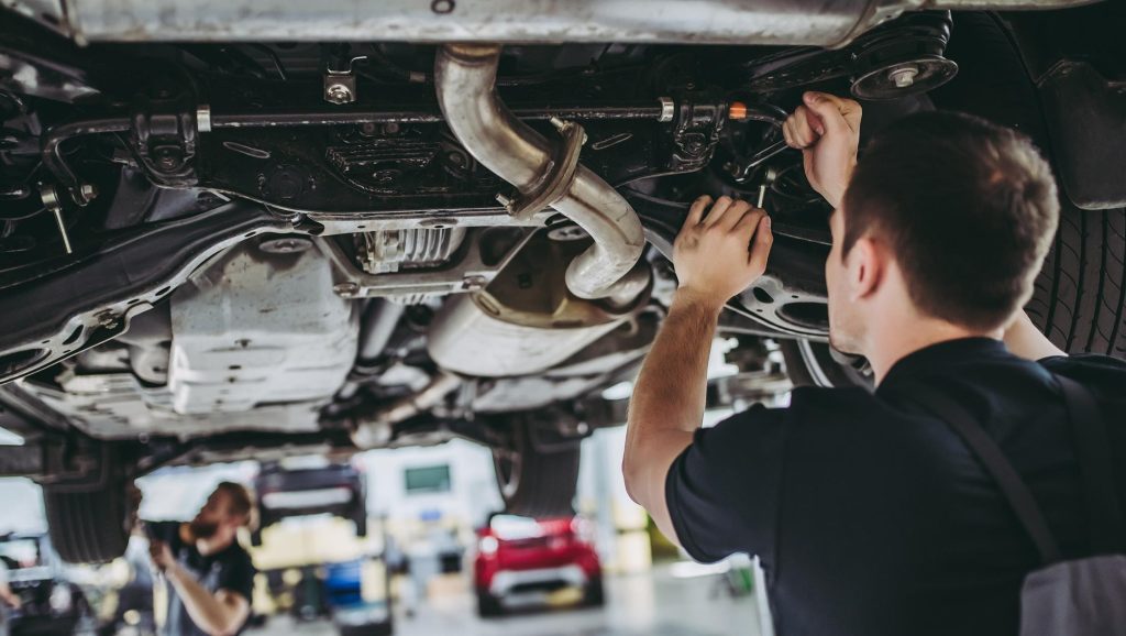 Mechanic working on engine